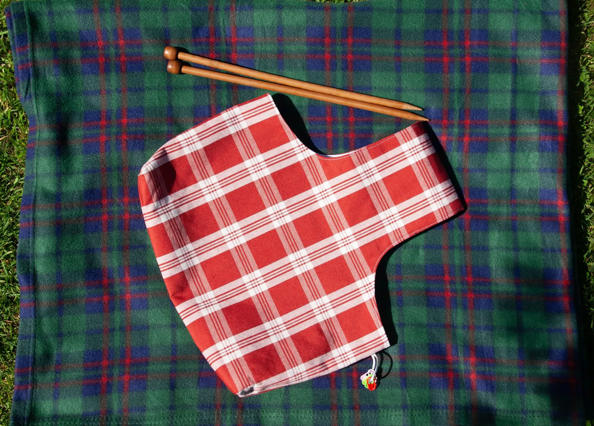 Wrist Plaid Rustikana Red L on the Floor.webp